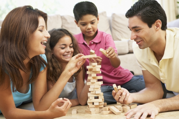 family playing game sat home