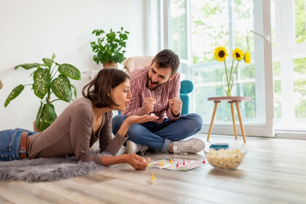 couple playing ludo board game